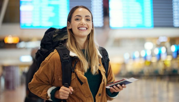 airport-travel-portrait-woman-with-passport-flight-ticket-information-immigration-journey-backpack-young-person-identity-document-international-registration-faq-about-us